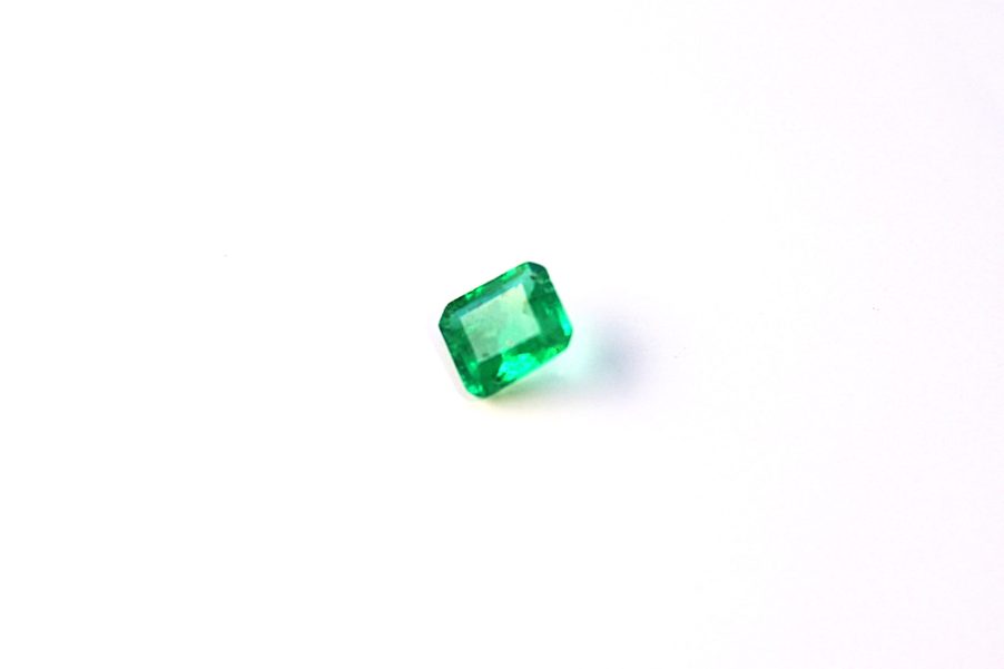 Medium light green natural Emerald in emerald cut