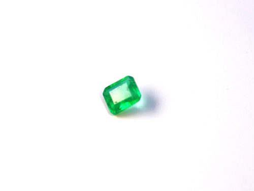 Medium light green natural Emerald in emerald cut