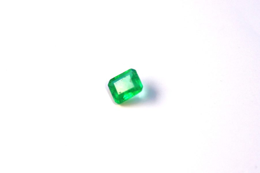 Medium light green natural Emerald in emerald cut