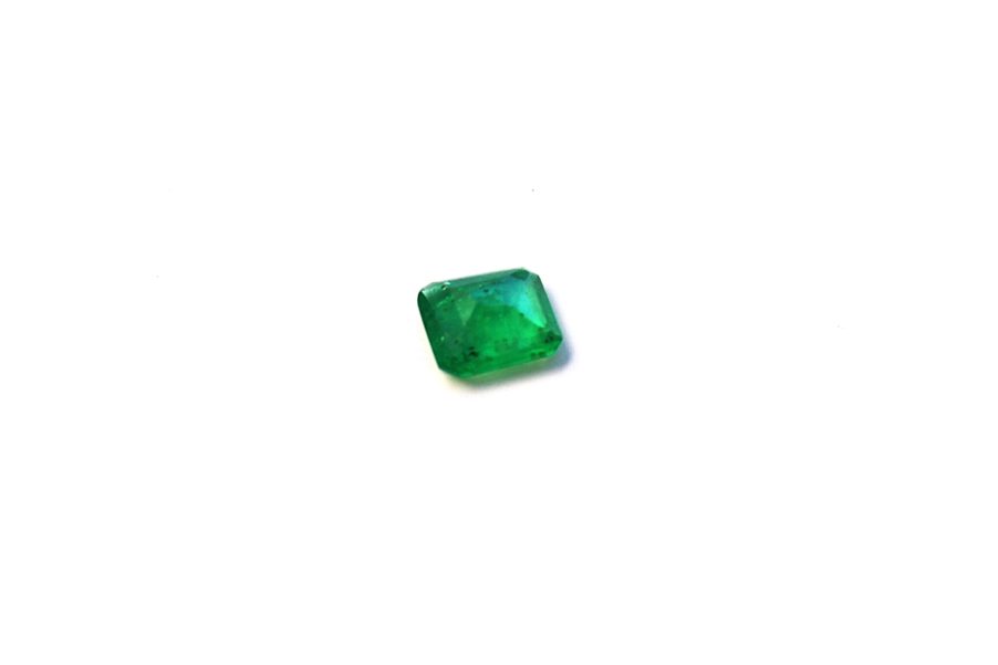 Medium light green natural Emerald in emerald cut