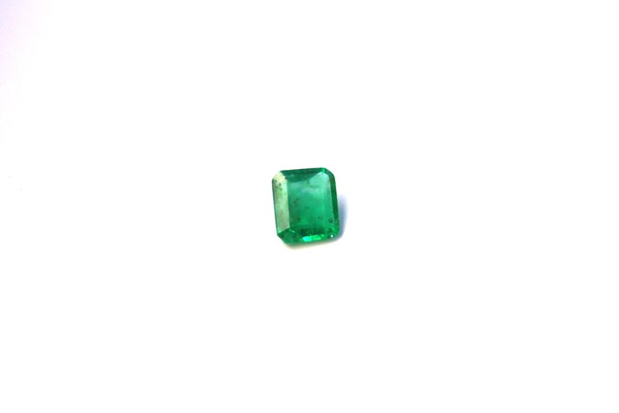 Medium light green natural Emerald in emerald cut