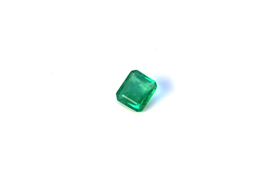 Medium light green natural Emerald in emerald cut